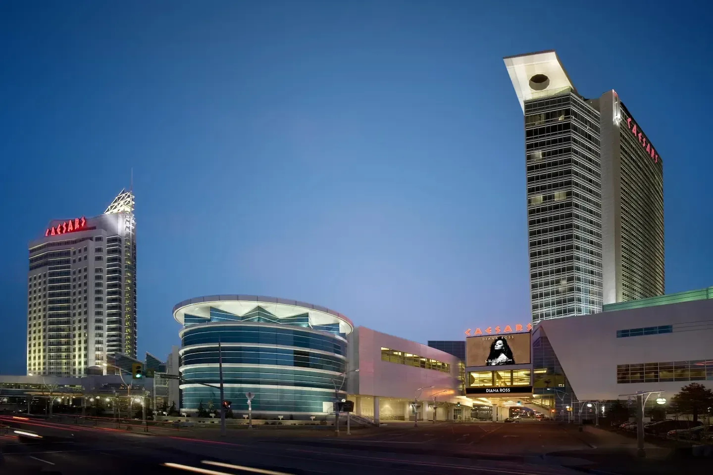 Hotel façade and illuminated entrance at night
