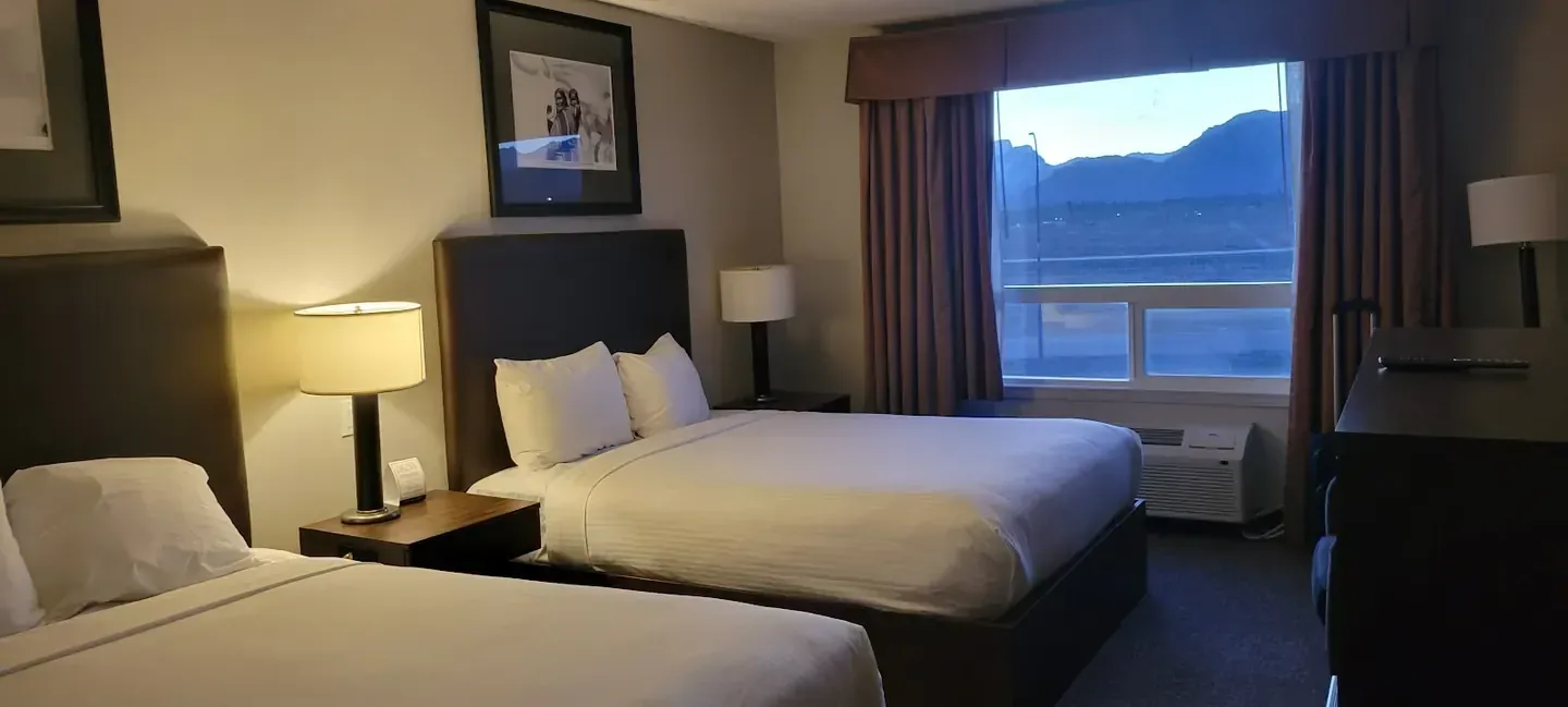 Mountain-resort lodging against highland landscape